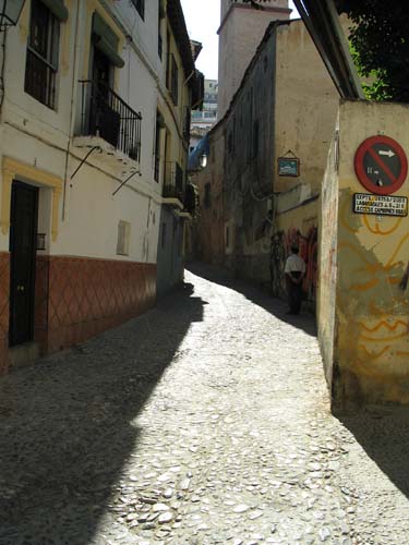 old man looking at street