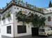 house with flowers in A