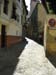 old man looking at street